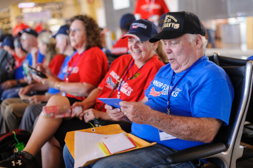 Veterans and Guardians waiting at the airport