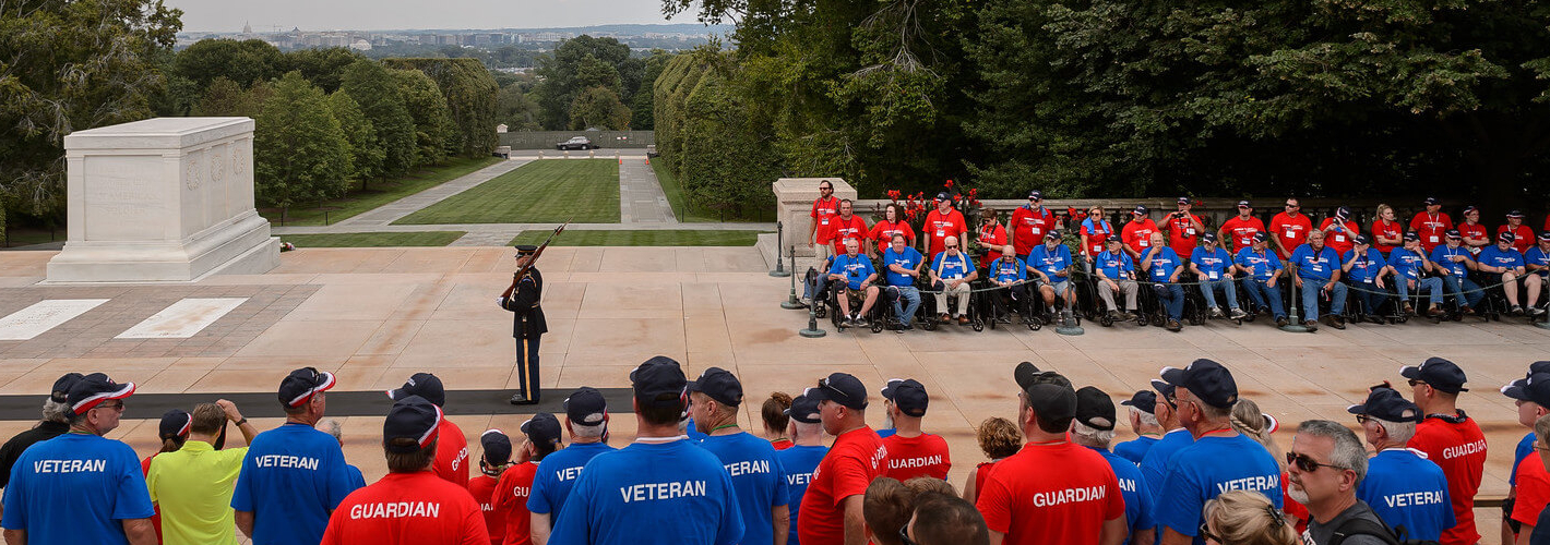 Honor Flight Veteran shaking hands with a civilian